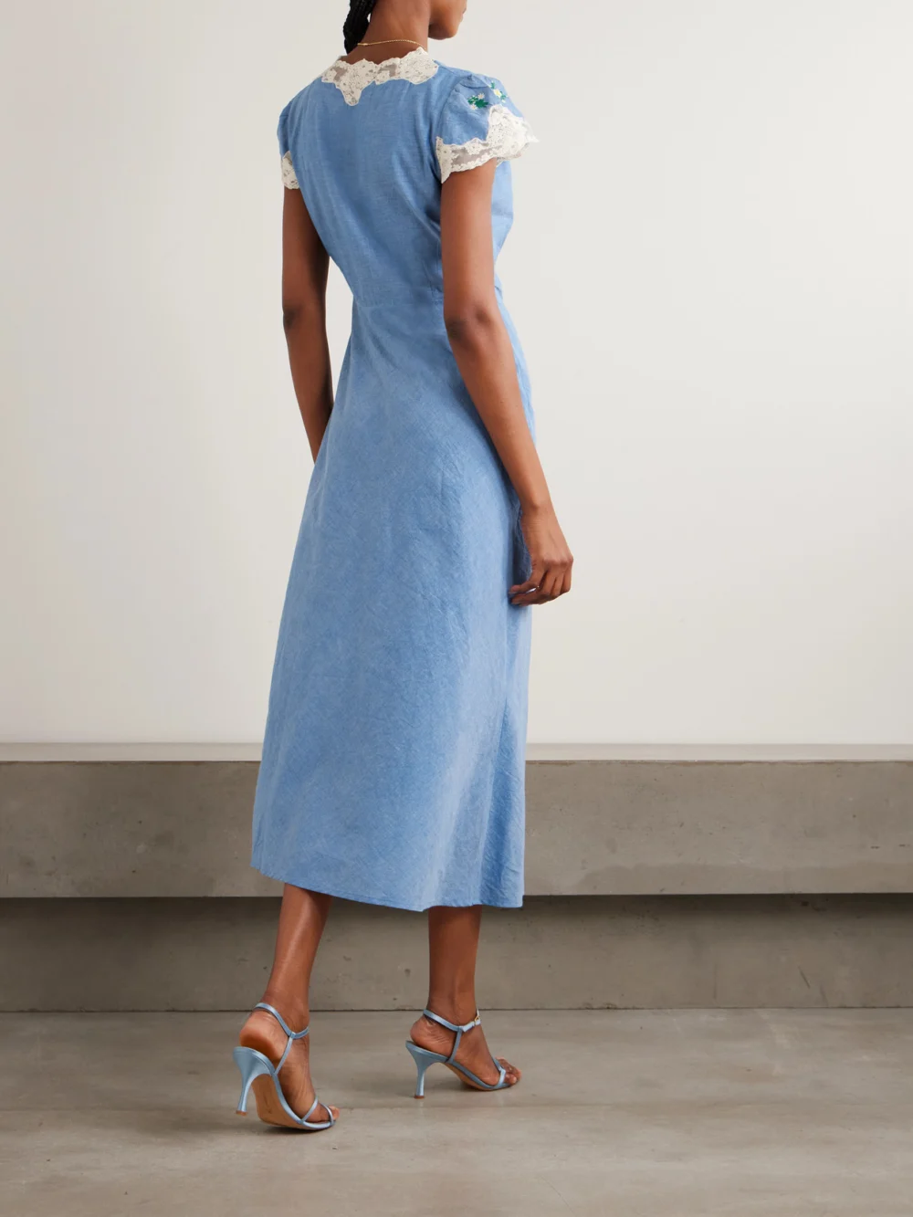 Back view of the Rixo Amari Lace-trimmed Embroidered Cotton-chambray Midi Dress