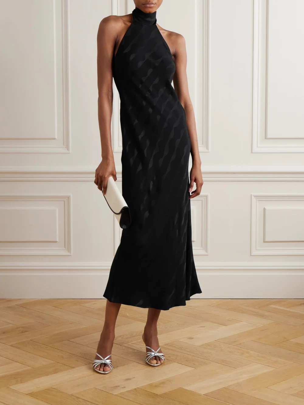 Rixo Maura Satin-jacquard Halterneck Midi Dress, worn by a model