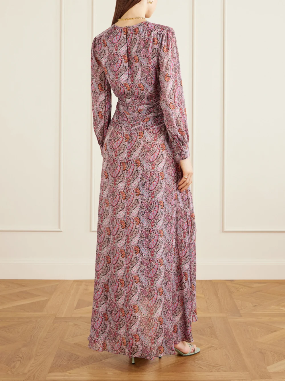 Back view of the Rixo Meera Gathered Paisley-print Chiffon Maxi Dress