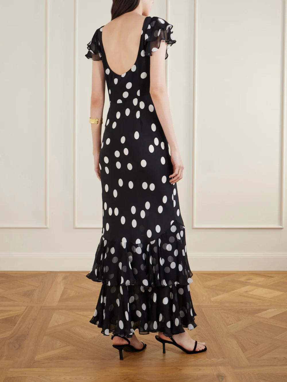 Back view of the Rixo Ordinia Polka-dot Crepon-trimmed Silk-satin Midi Dress
