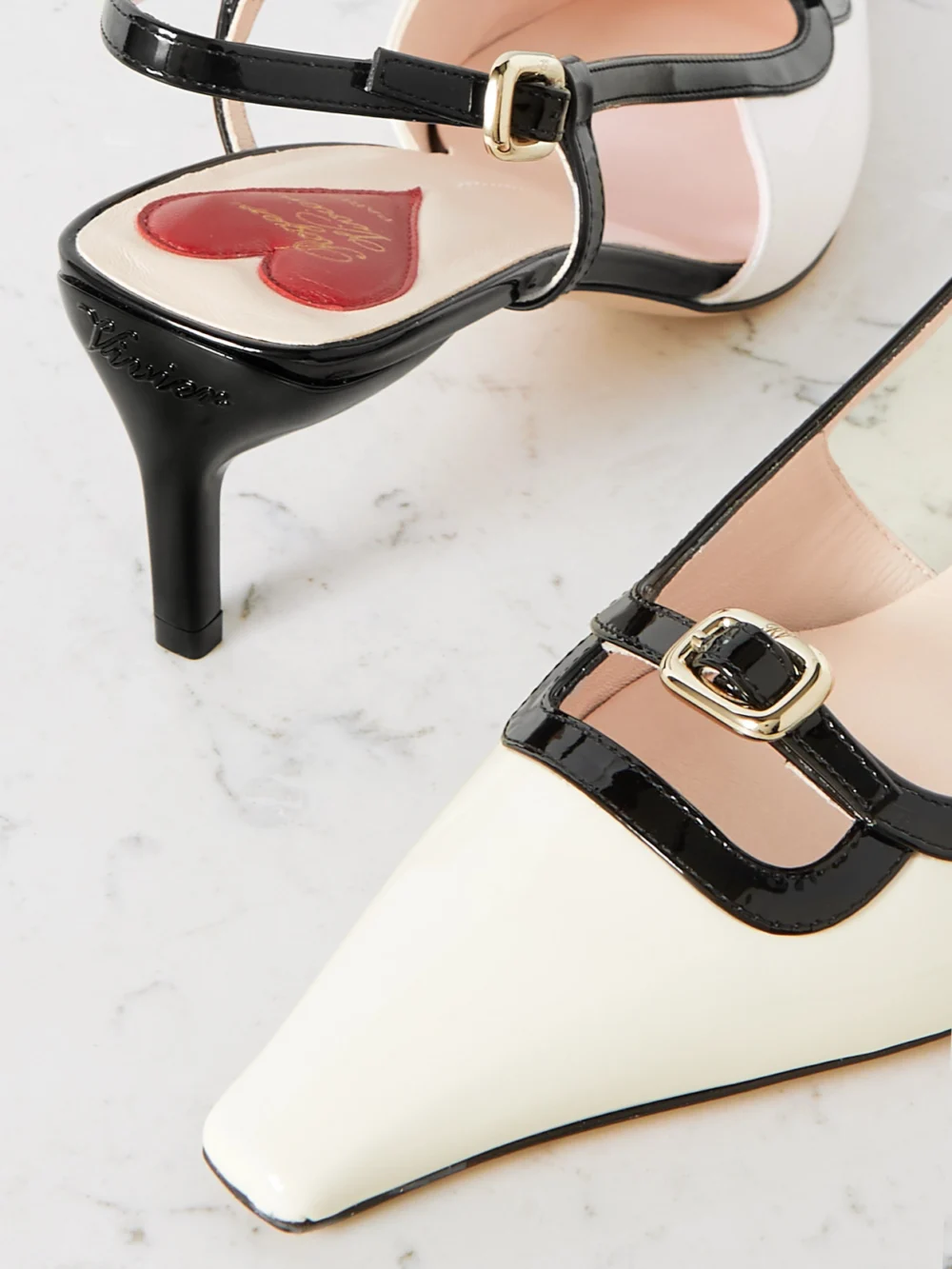 Close-up detail of the Roger Vivier 55 Two-tone Patent-leather Slingback Pumps