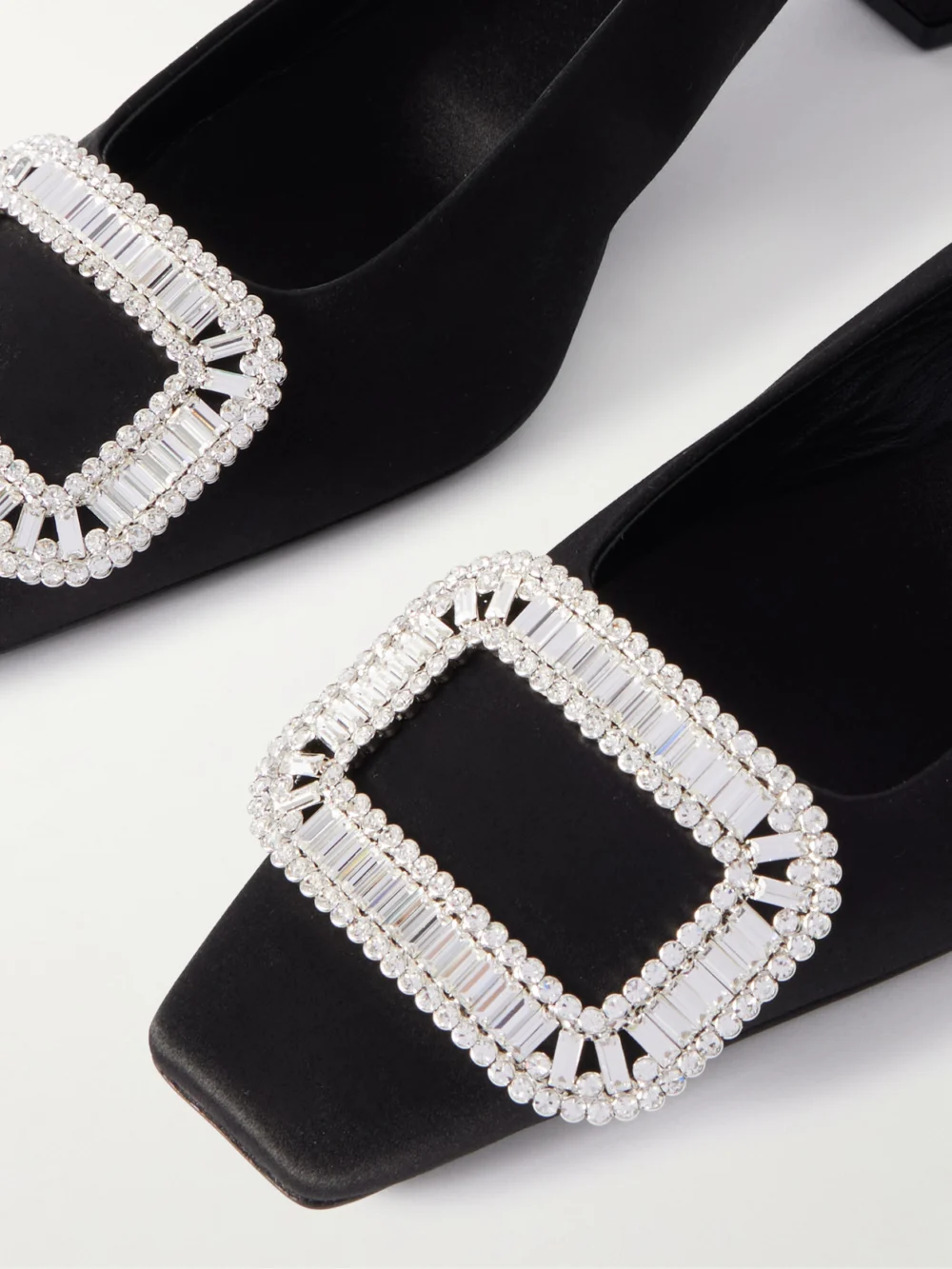 Close-up detail of the Roger Vivier Belle Vivier Pilgrim 45 Crystal-embellished Satin Slingback Pumps