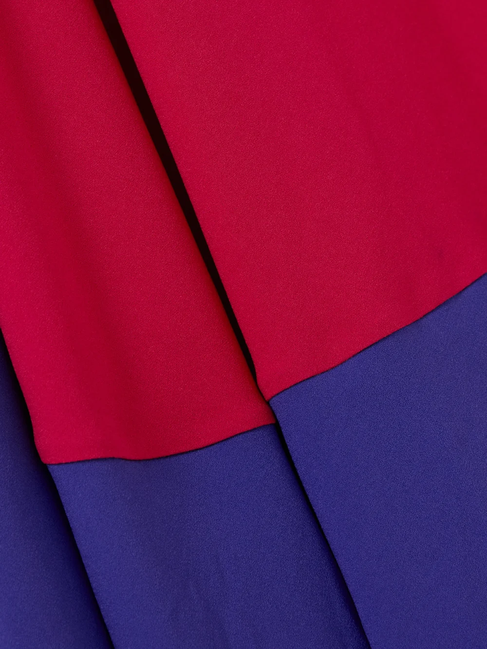 Close-up detail of the Roksanda Awn Asymmetric Two-tone Crepe Dress