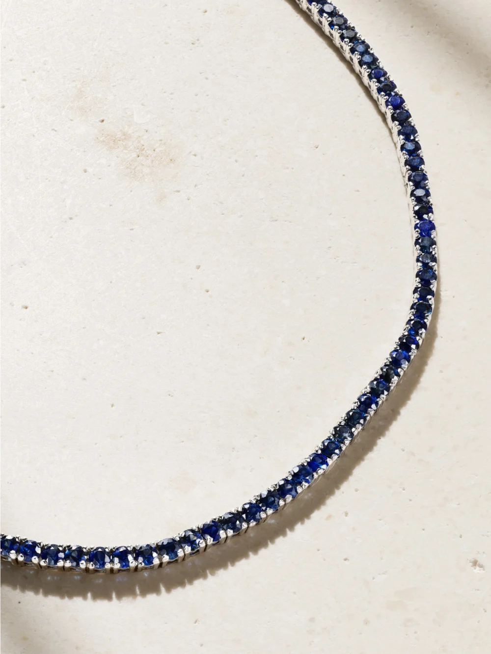 Close-up detail of the Roxanne First 14-karat White Gold Sapphire Tennis Necklace