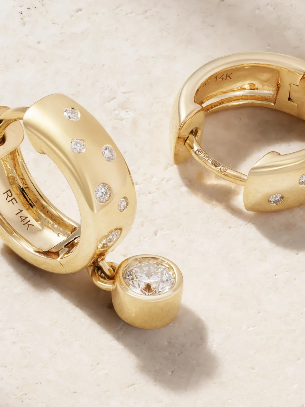 Close-up detail of the Roxanne First Polka-dot Drop 14-karat Gold Diamond Hoop Earrings