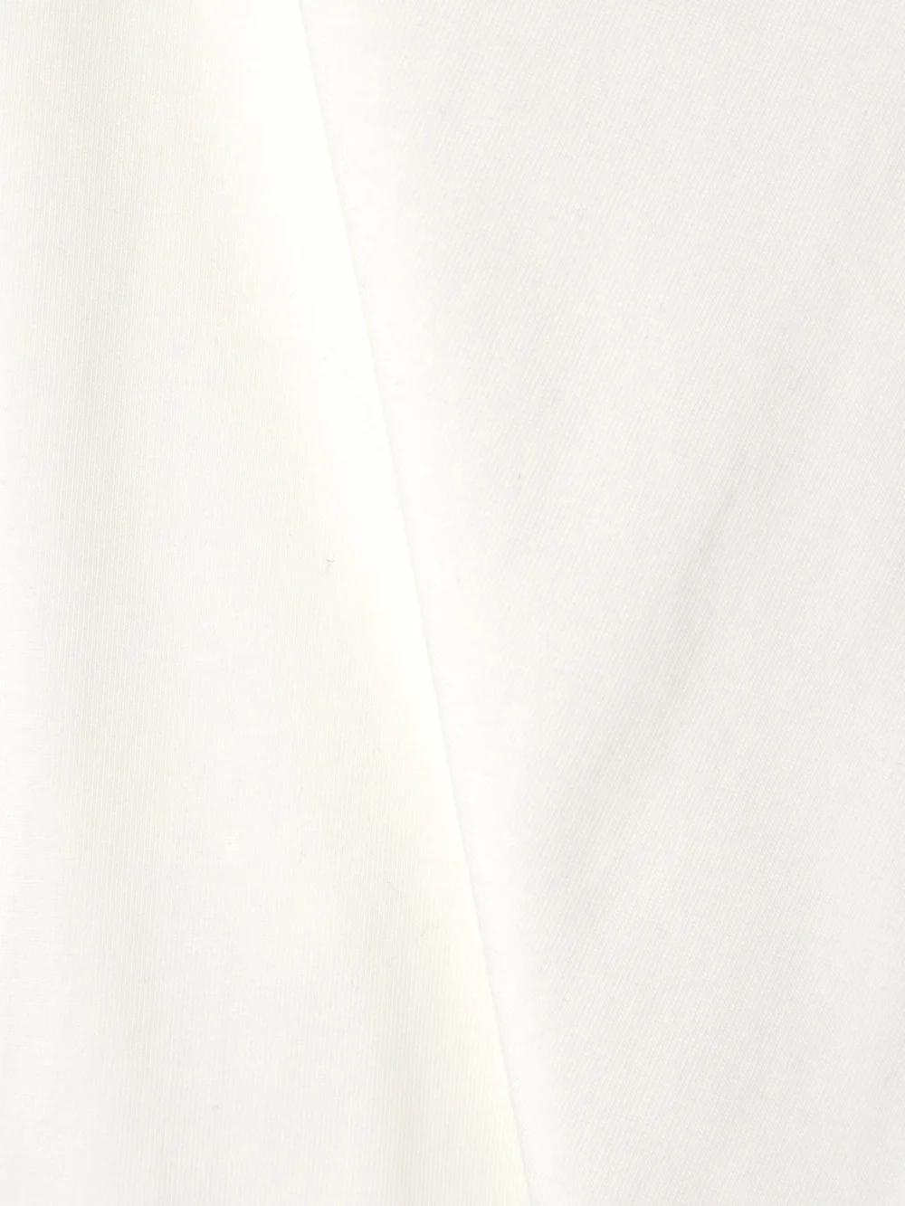 Close-up detail of the Rùadh Braun Embroidered Organic Cotton-jersey Maxi Dress