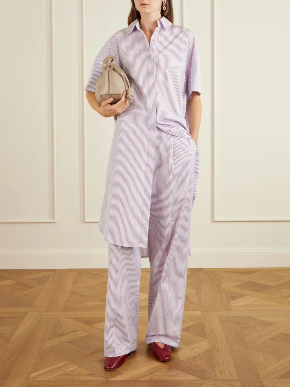 Rùadh Dean Pleated Striped Organic Cotton-poplin Wide-leg Pants, worn by a model