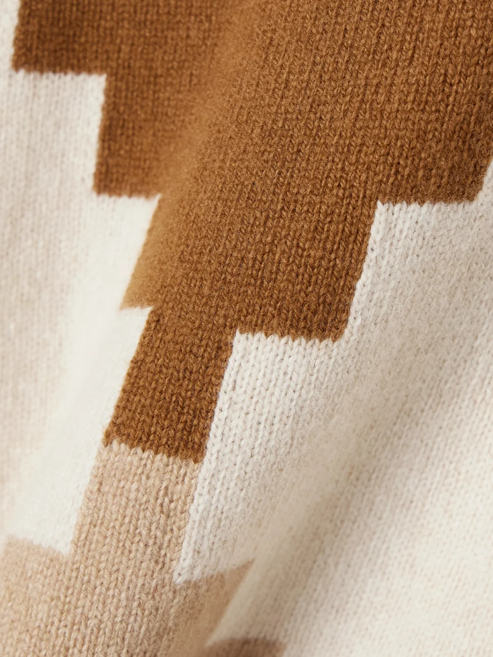 Close-up detail of the Rùadh The Ava Jacquard-knit Wool Sweater