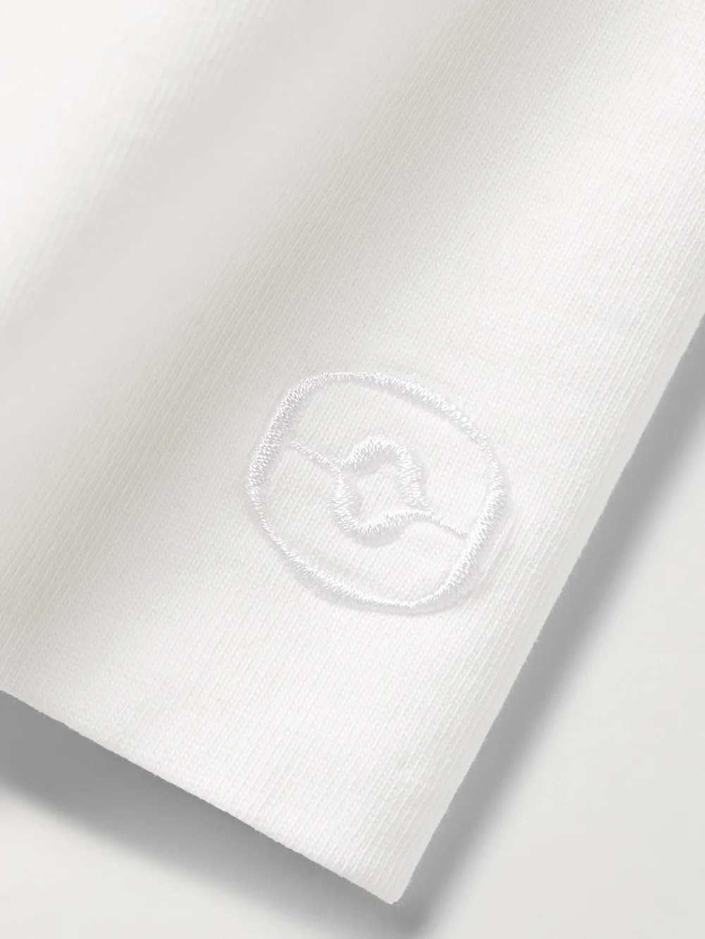 Close-up detail of the Rùadh The Isla Organic Cotton-jersey T-shirt