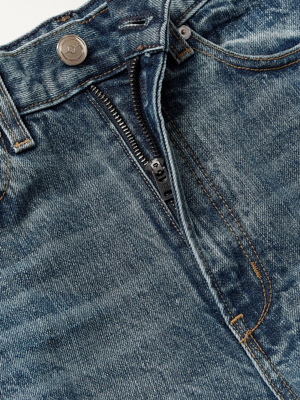 Close-up detail of the Rùadh The Quinn High-rise Straight-leg Jeans
