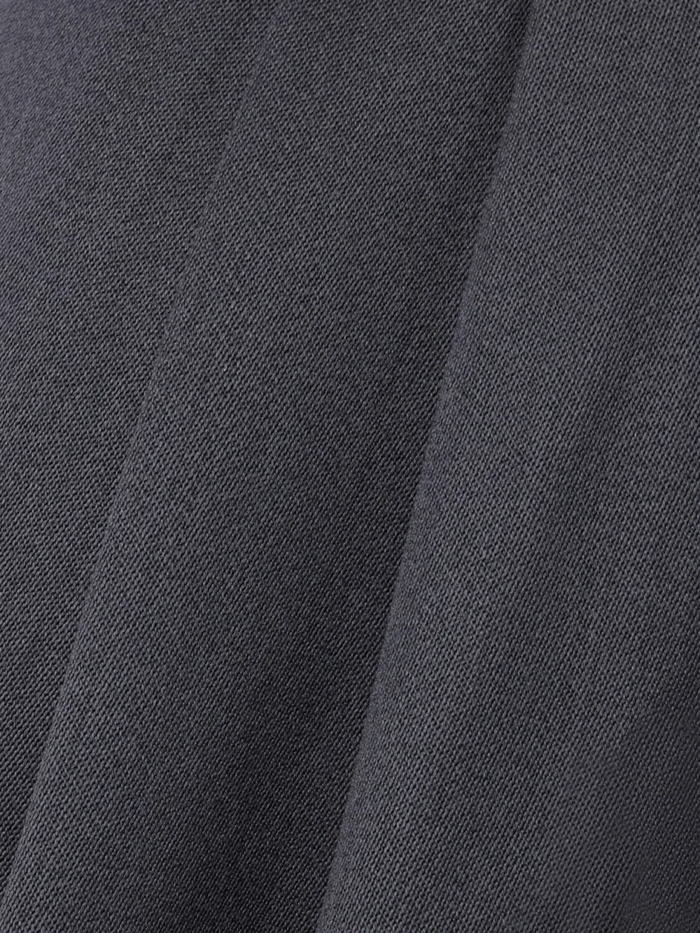 Close-up detail of the Rùadh The Russel Pleated Wool Wide-leg Pants