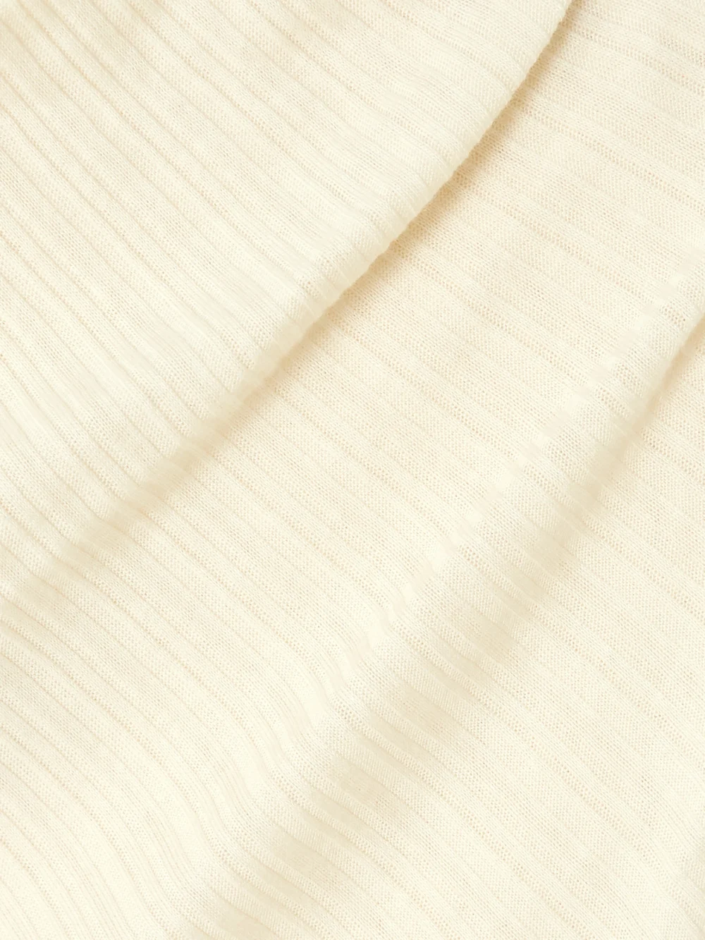 Close-up detail of the Rùadh Toga Draped Ribbed Organic Cotton and Modal-blend Top