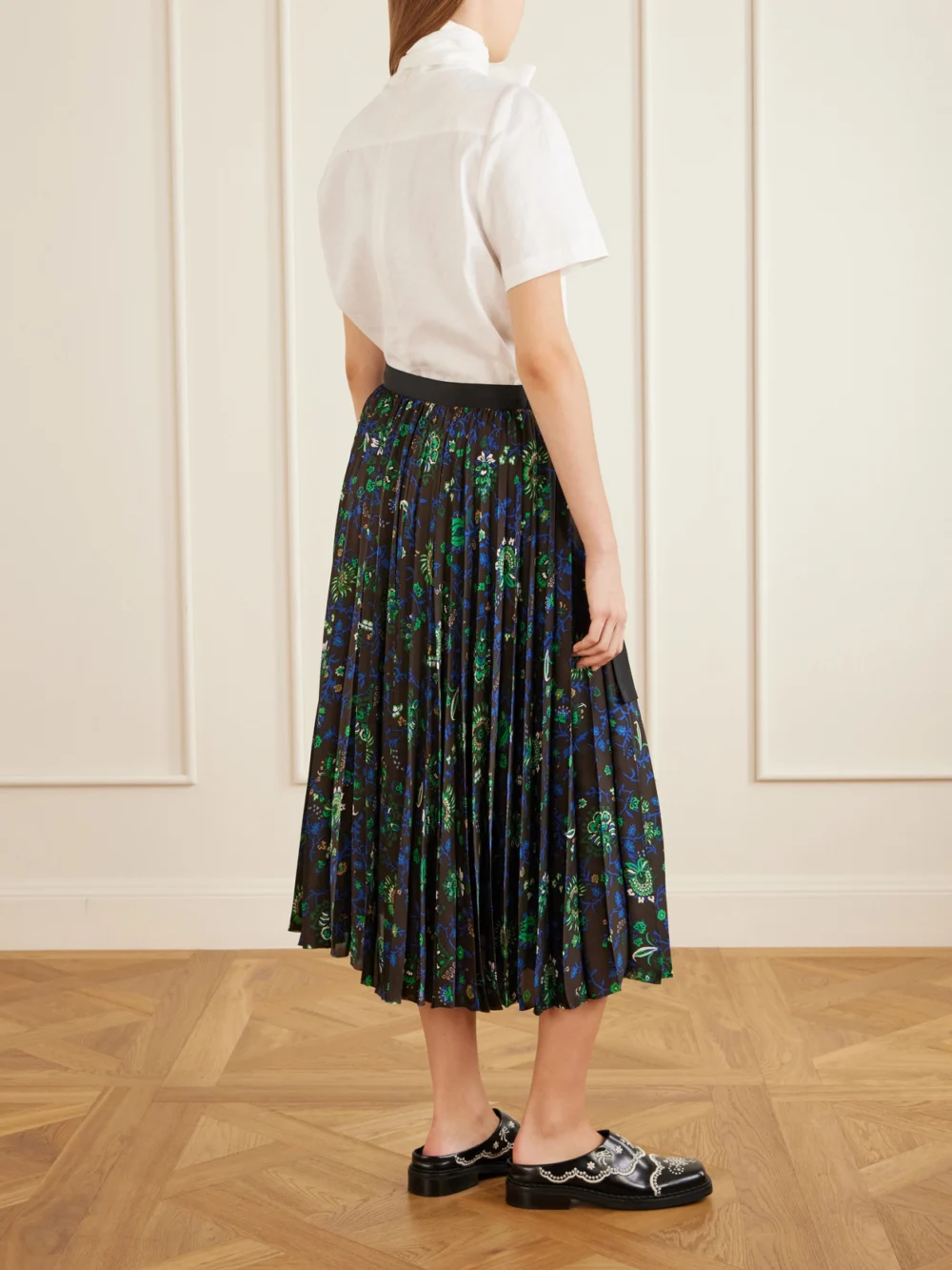 Back view of the Sacai Belted Grosgrain-trimmed Pleated Floral-print Georgette Midi Skirt