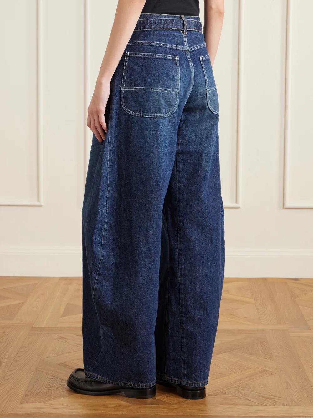 Back view of the Sacai Belted High-rise Barrel-leg Jeans