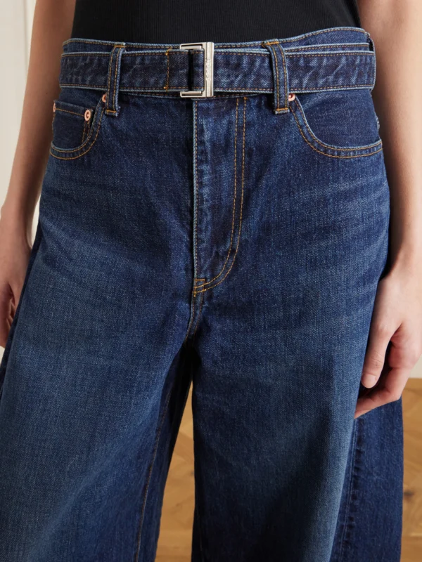 Close-up detail of the Sacai Belted High-rise Barrel-leg Jeans