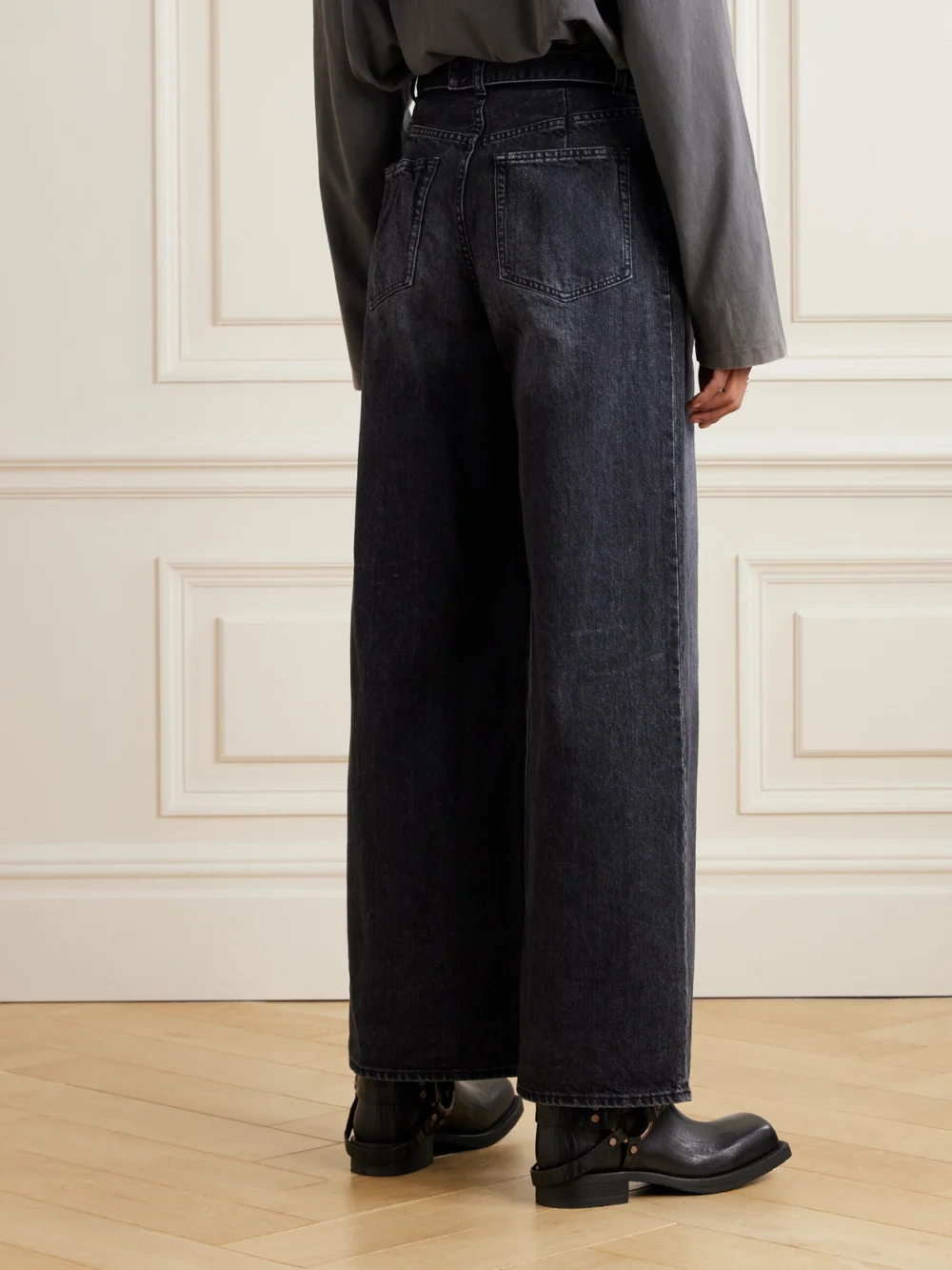 Back view of the Sacai Belted High-rise Wide-leg Jeans