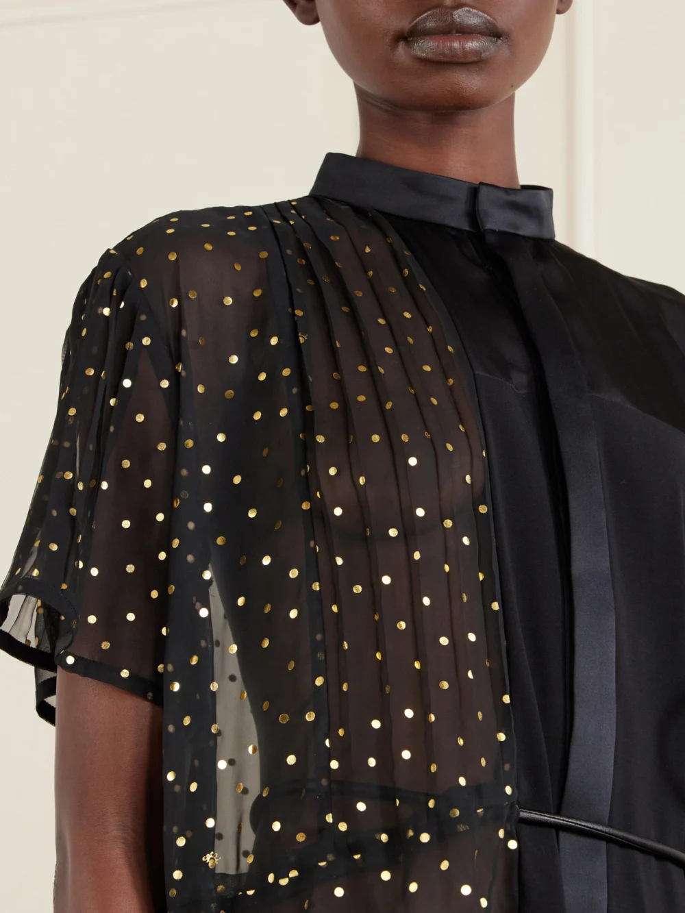 Close-up detail of the Sacai Belted Polka-dot Chiffon and Satin Midi Dress