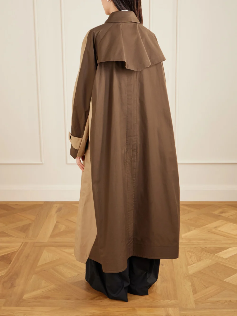 Back view of the Sacai Belted Two-tone Cotton-blend Gabardine Trench Coat