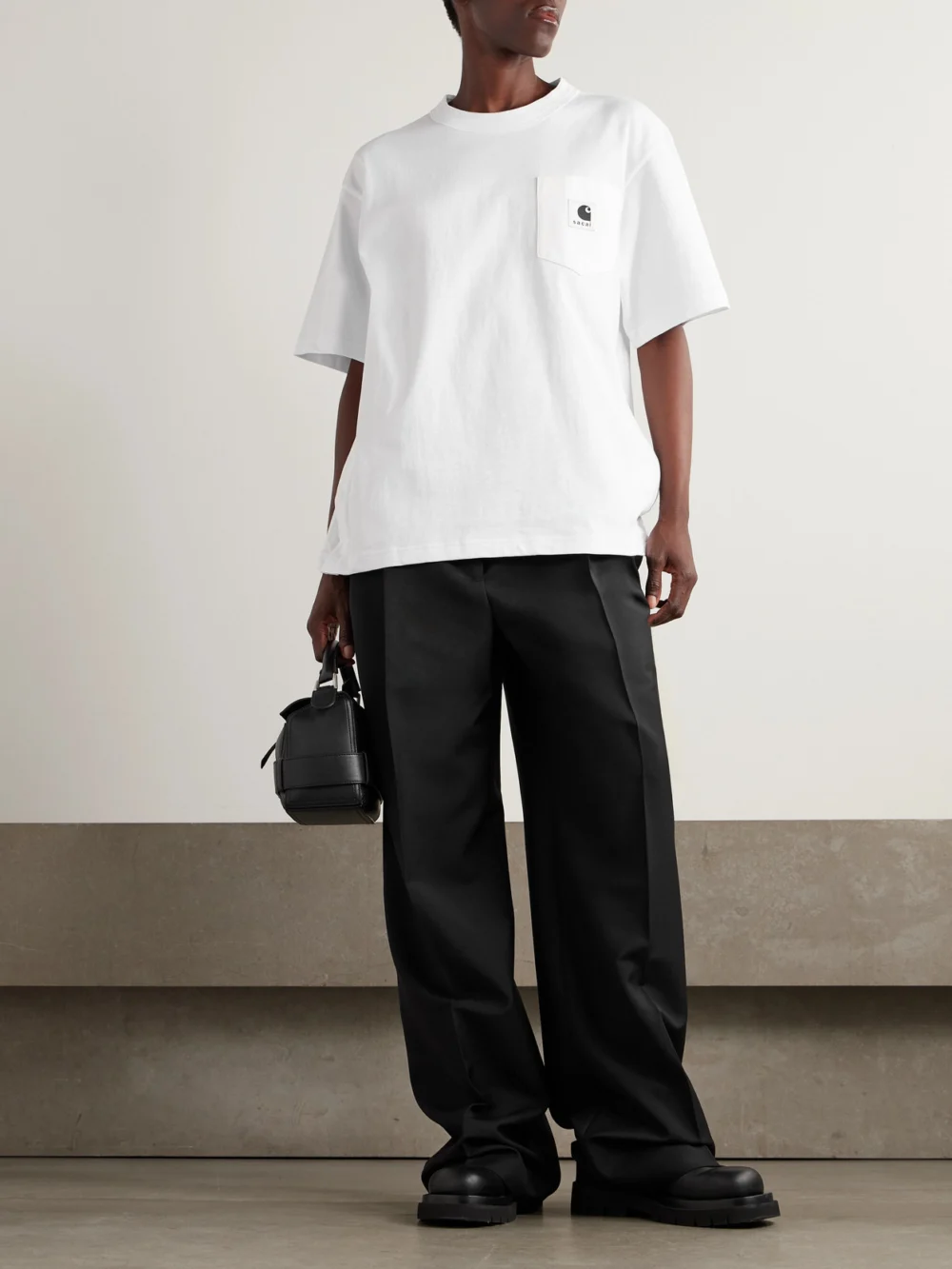 Sacai + Carhartt Wip Appliquéd Canvas-trimmed Cotton-jersey T-shirt, worn by a model
