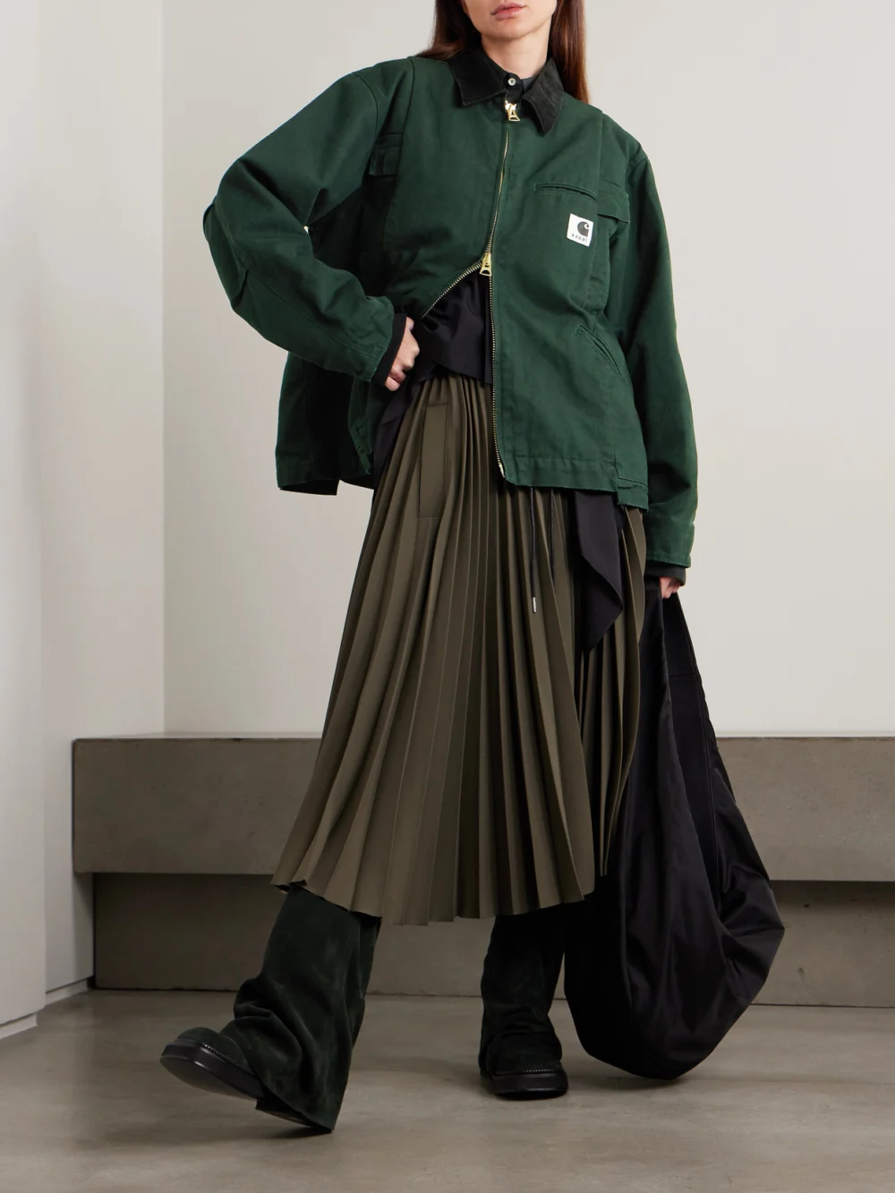 Sacai + Carhartt Wip Duck Oversized Corduroy-trimmed Appliquéd Cotton-canvas Jacket, worn by a model