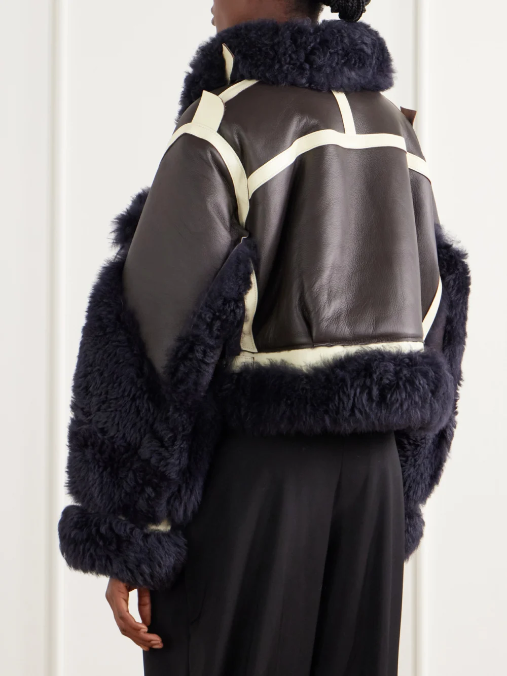 Back view of the Sacai Color-block Shearling-trimmed Leather Jacket