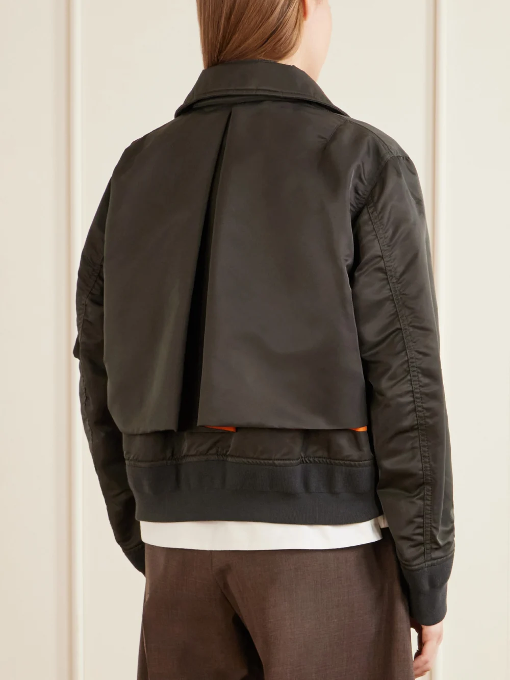 Back view of the Sacai Cropped Padded Shell Bomber Jacket