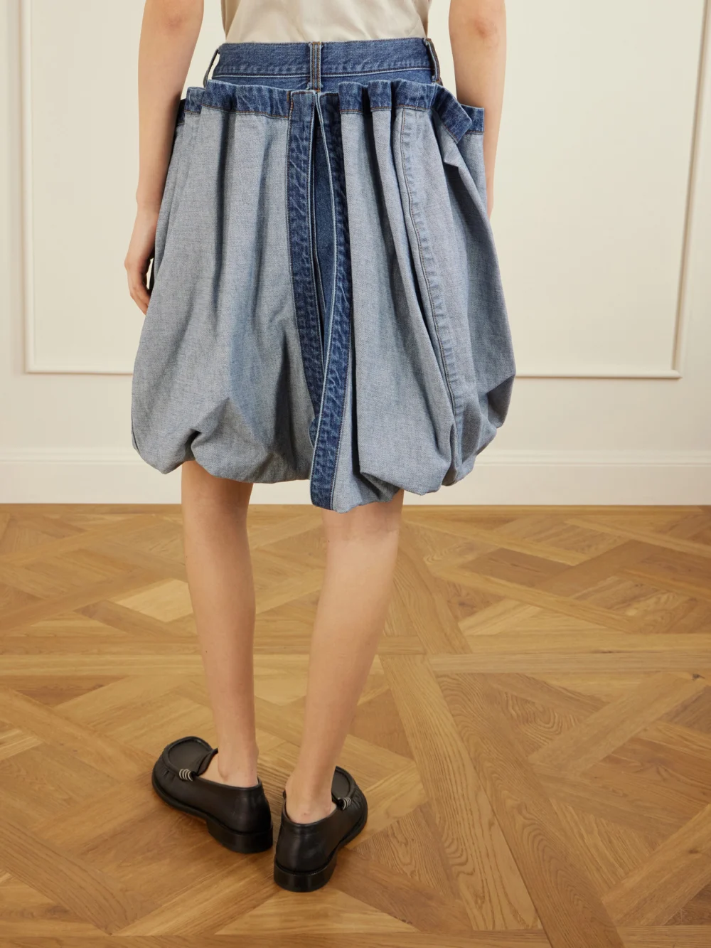 Back view of the Sacai Folded Denim Skirt