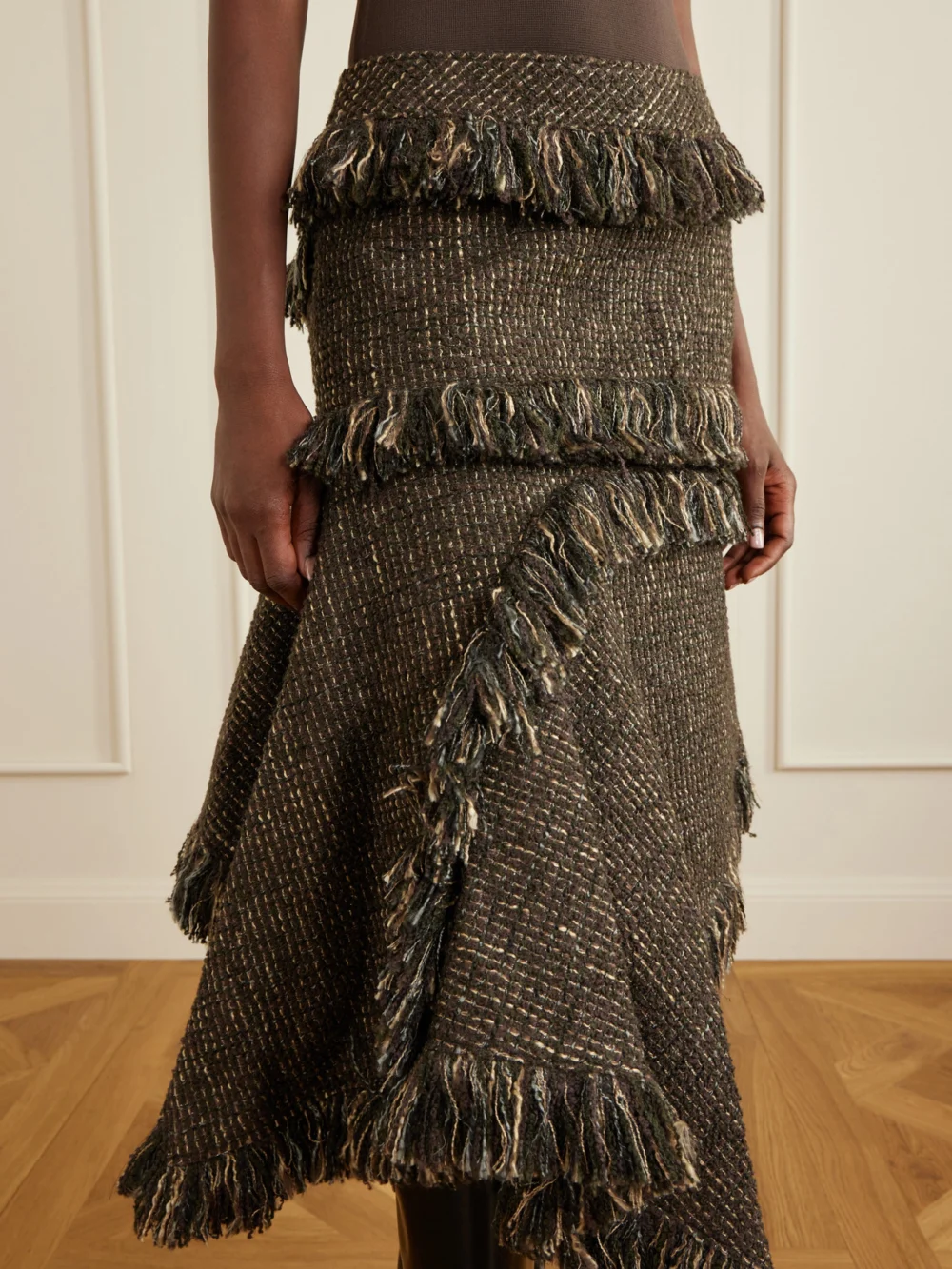 Close-up detail of the Sacai Fringed Wool-blend Tweed Midi Skirt