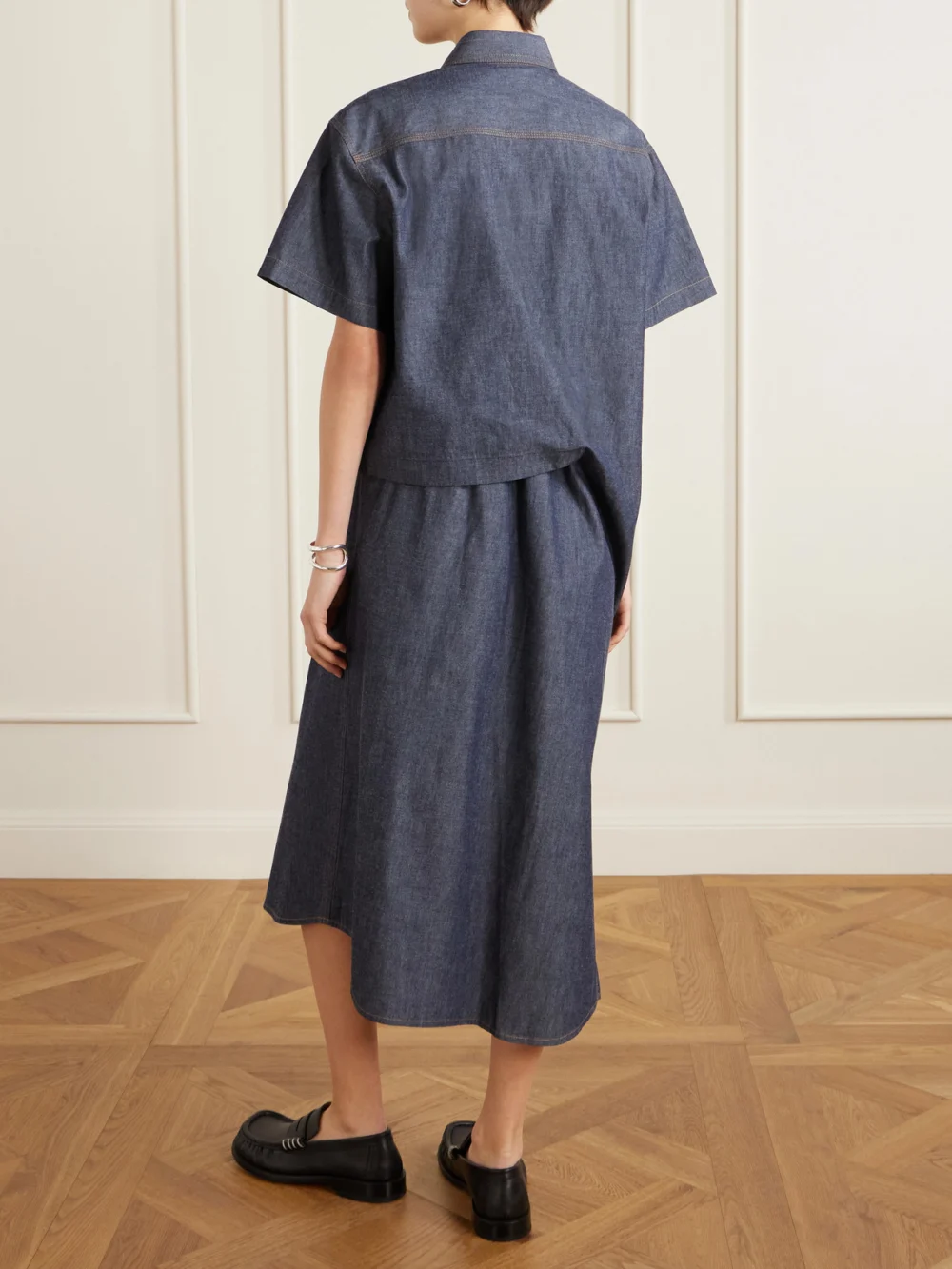 Back view of the Sacai Gathered Denim Midi Dress