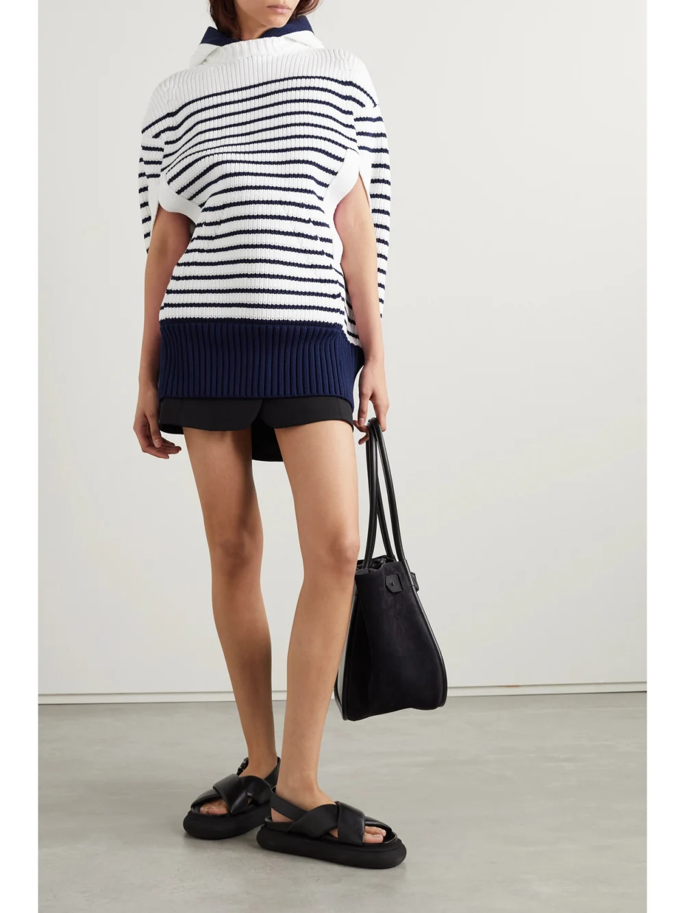 Sacai Hooded Striped Ribbed-knit Cape, worn by a model