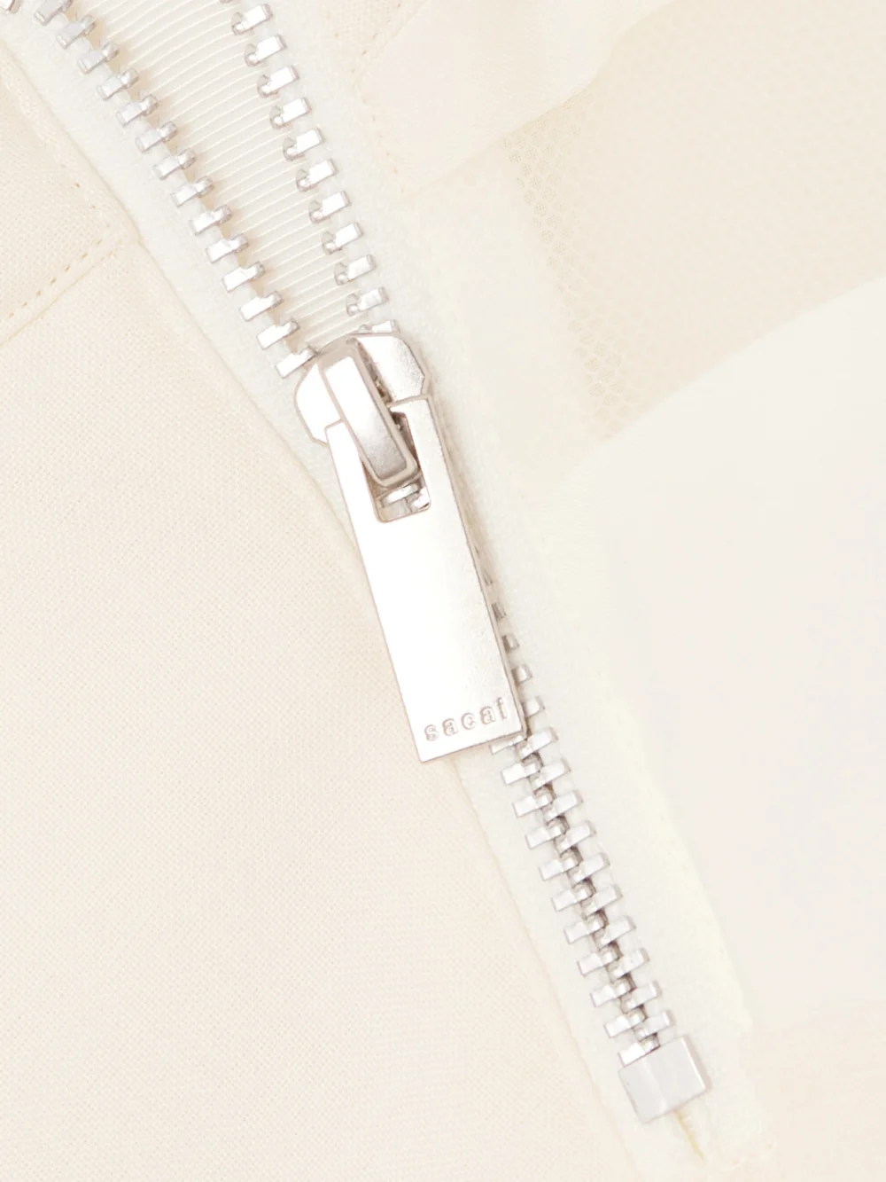 Close-up detail of the Sacai Layered Canvas and Chiffon T-shirt