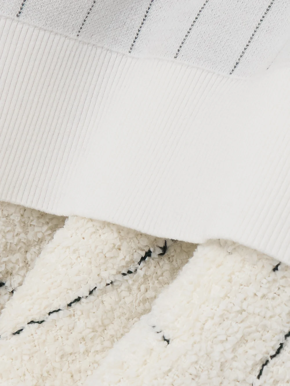 Close-up detail of the Sacai Layered Striped Cotton and Bouclé-tweed Sweater