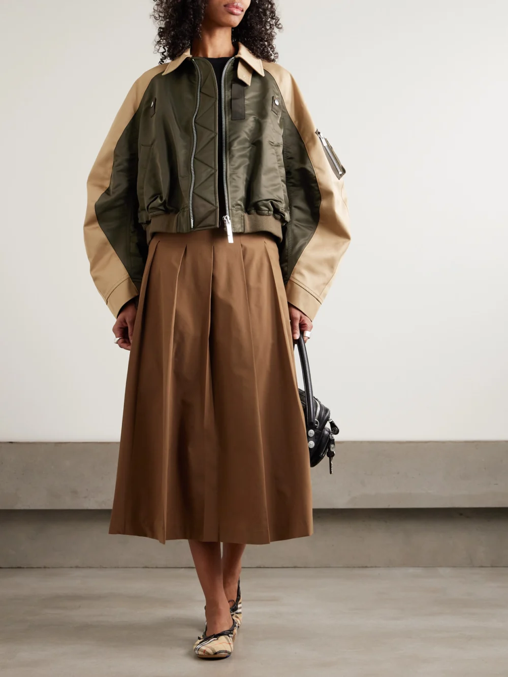 Sacai Oversized Cotton-canvas and Shell Bomber Jacket, worn by a model