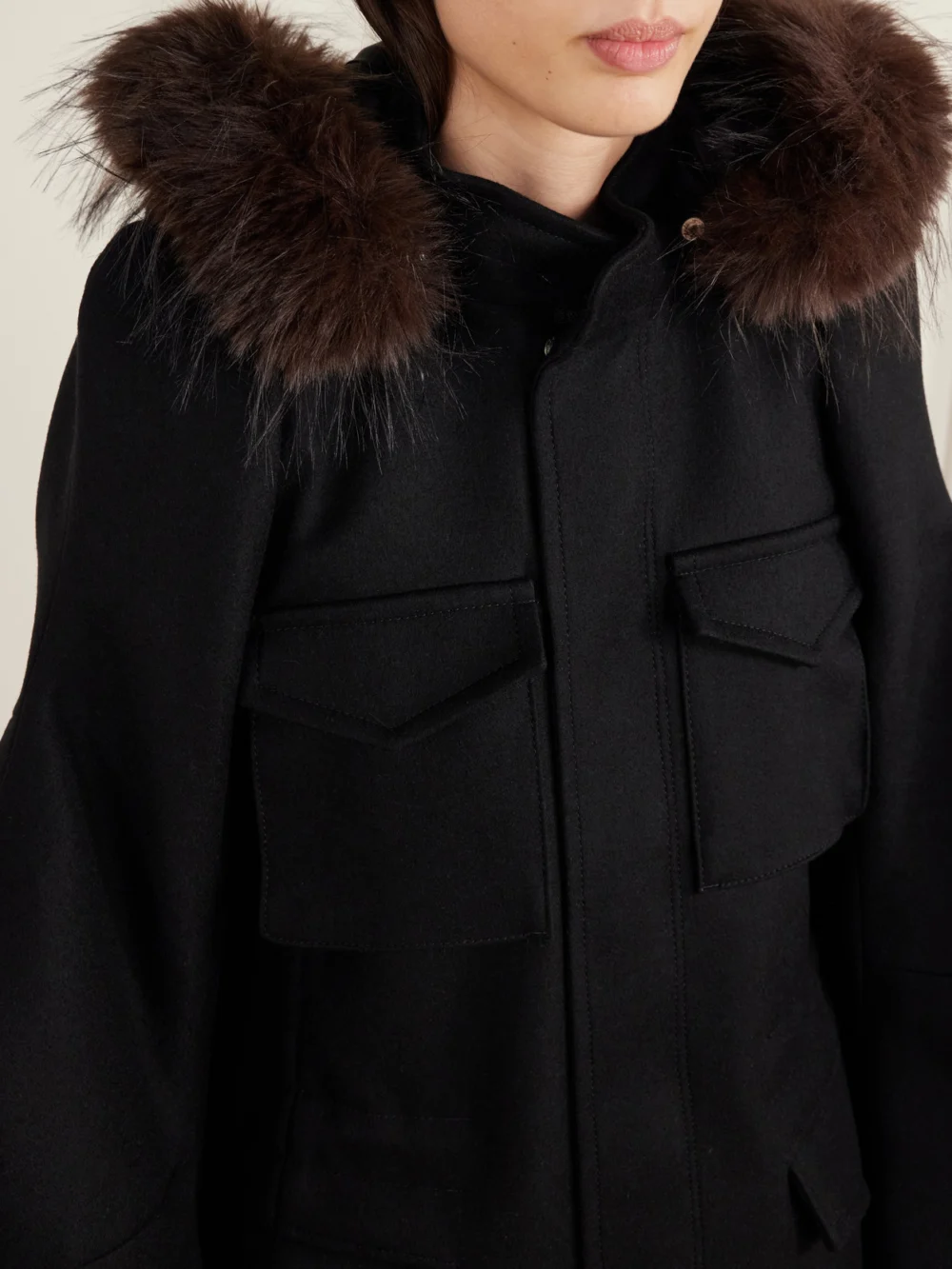 Close-up detail of the Sacai Padded Plush-trimmed Wool Coat