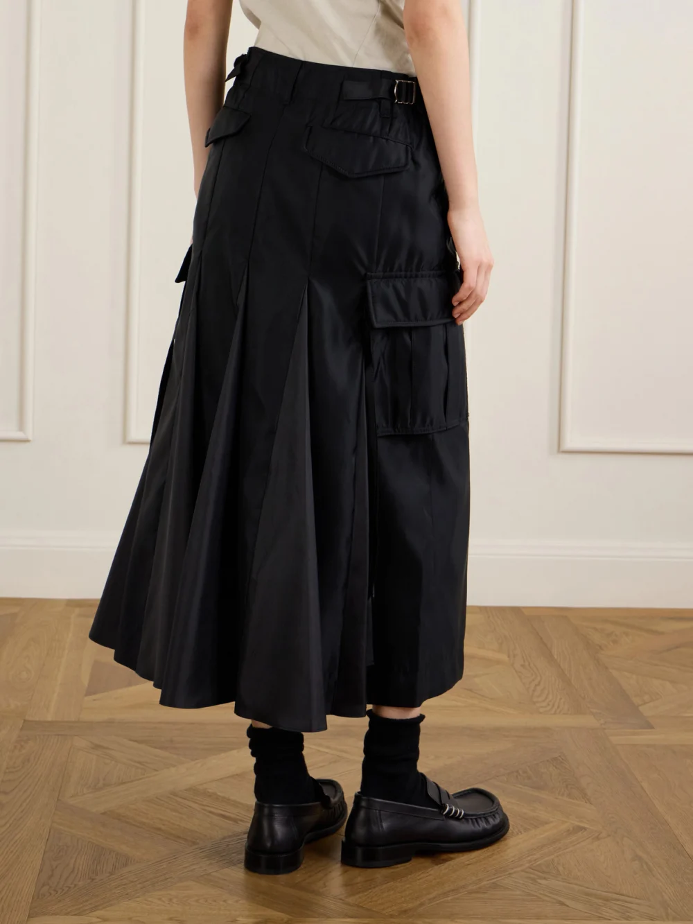 Back view of the Sacai Padded Twill Midi Skirt