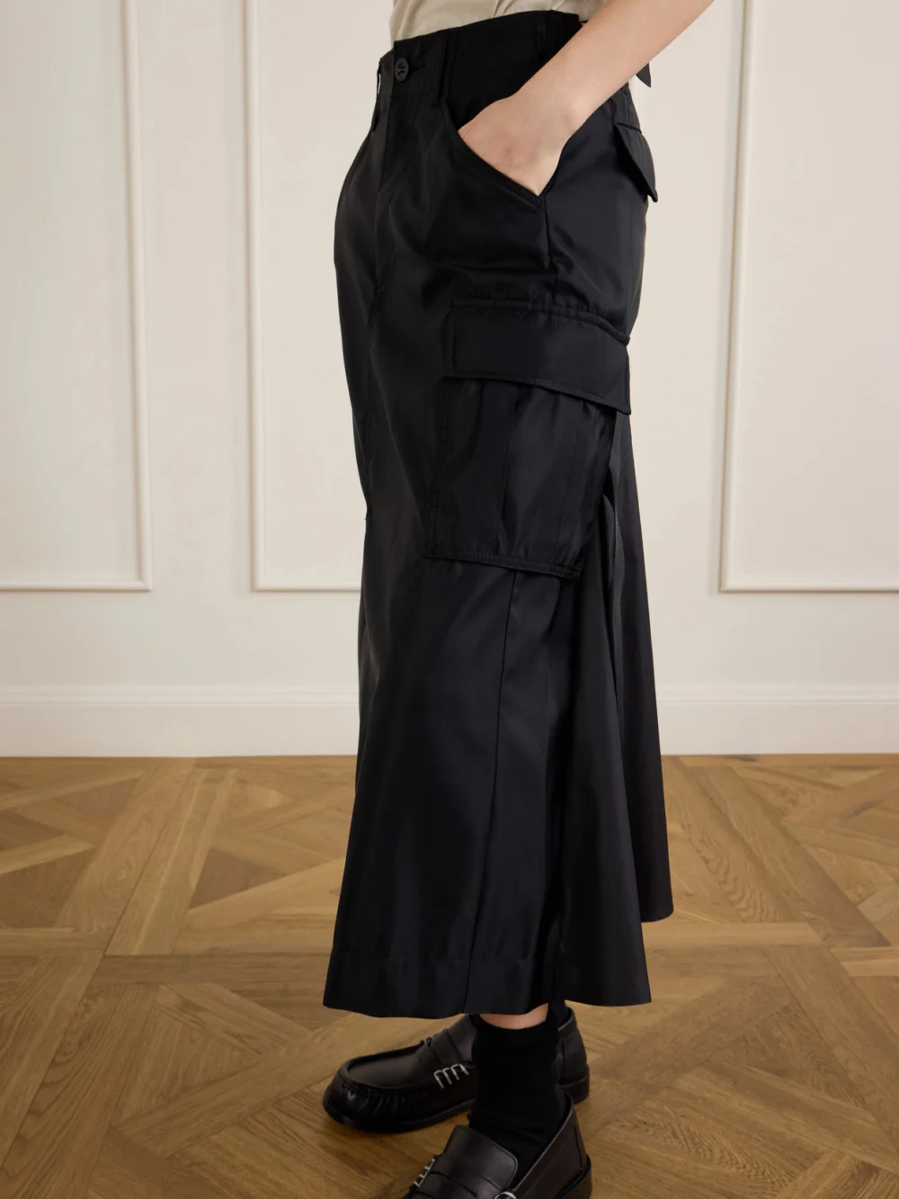 Close-up detail of the Sacai Padded Twill Midi Skirt