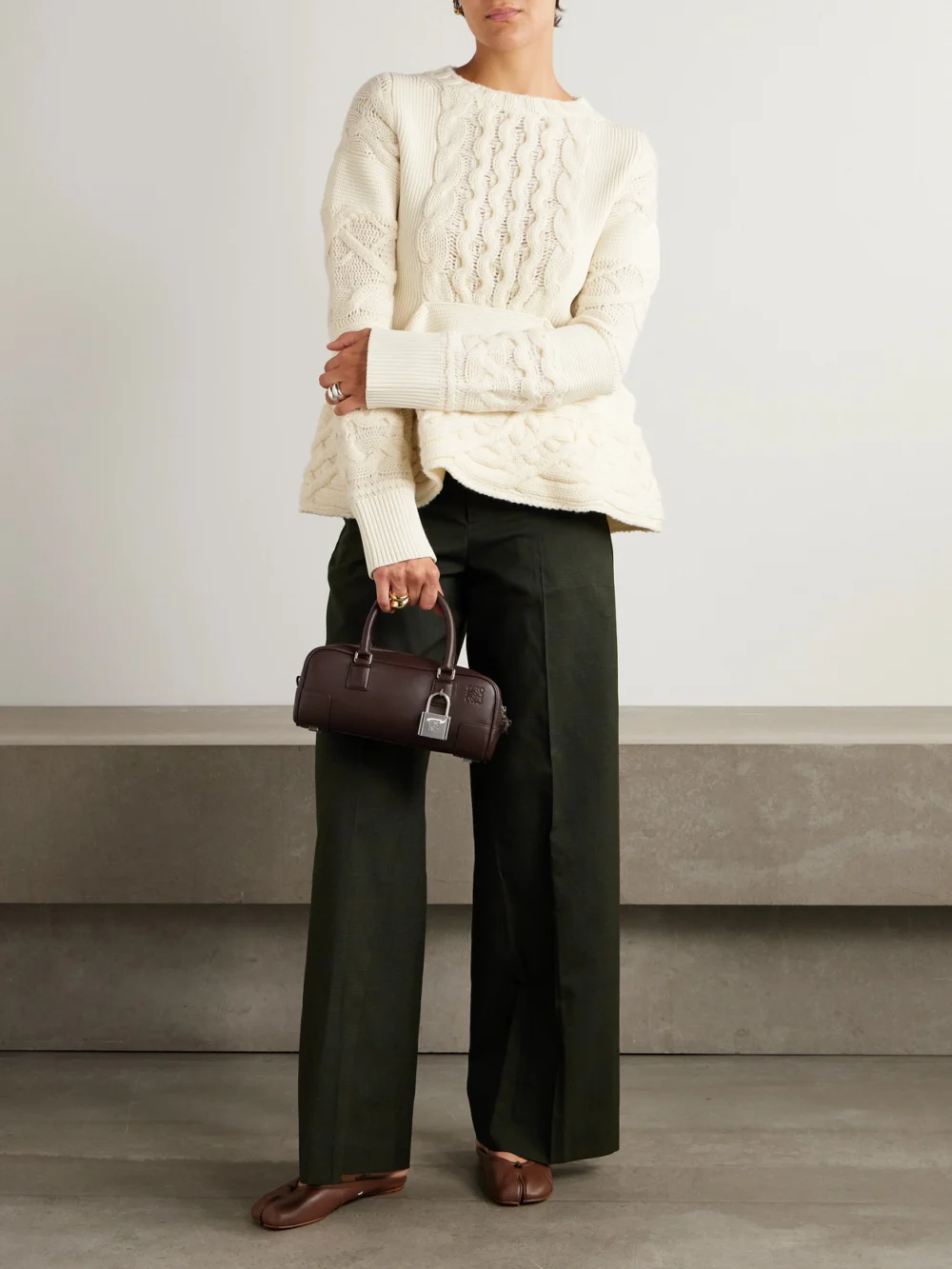 Sacai Paneled Cable-knit Wool Sweater, worn by a model