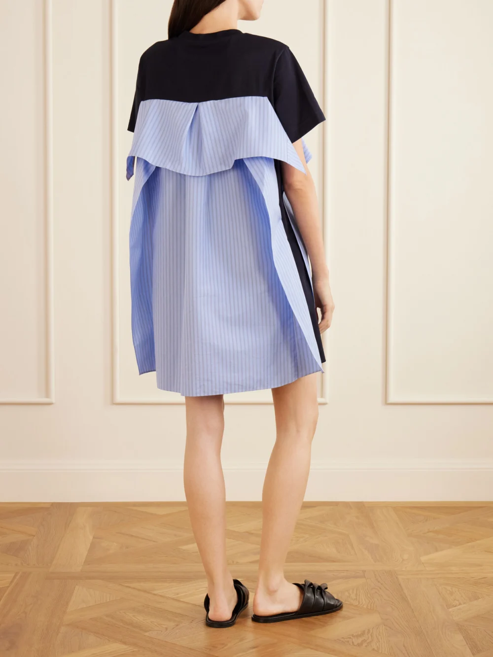 Back view of the Sacai Paneled Ruffled Cotton-jersey and Poplin Mini Dress