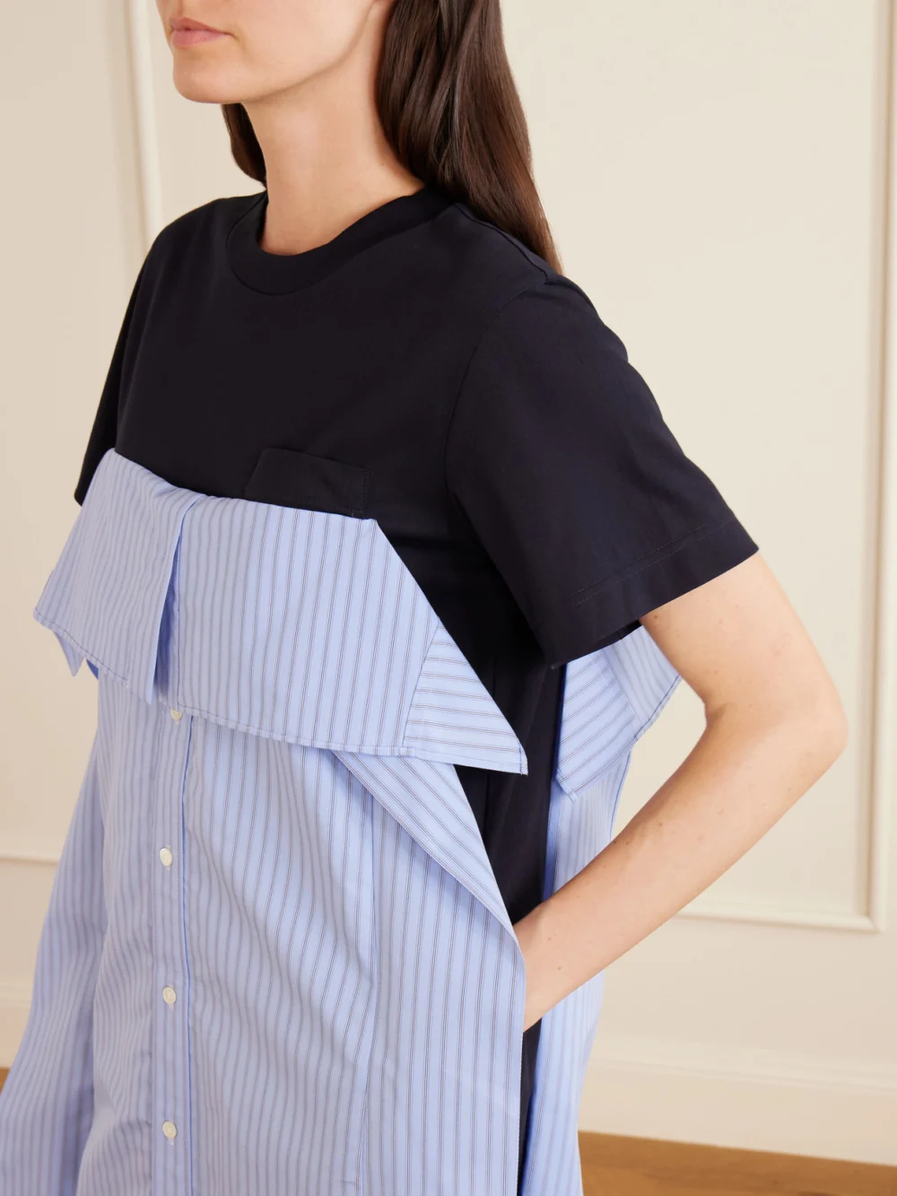 Close-up detail of the Sacai Paneled Ruffled Cotton-jersey and Poplin Mini Dress