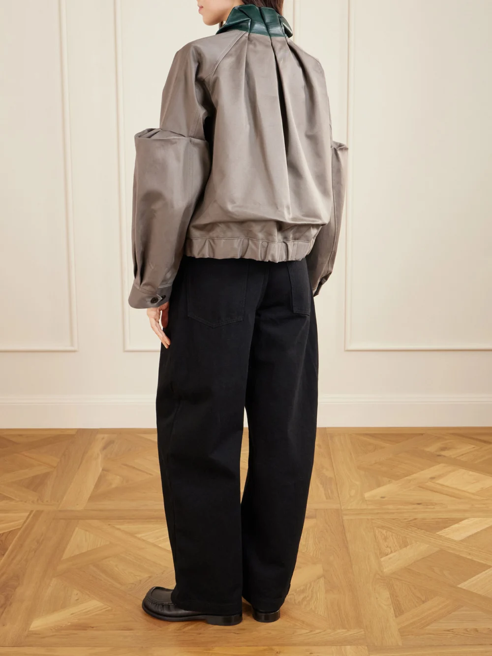 Back view of the Sacai Pleated Leather-trimmed Cotton-twill Jacket
