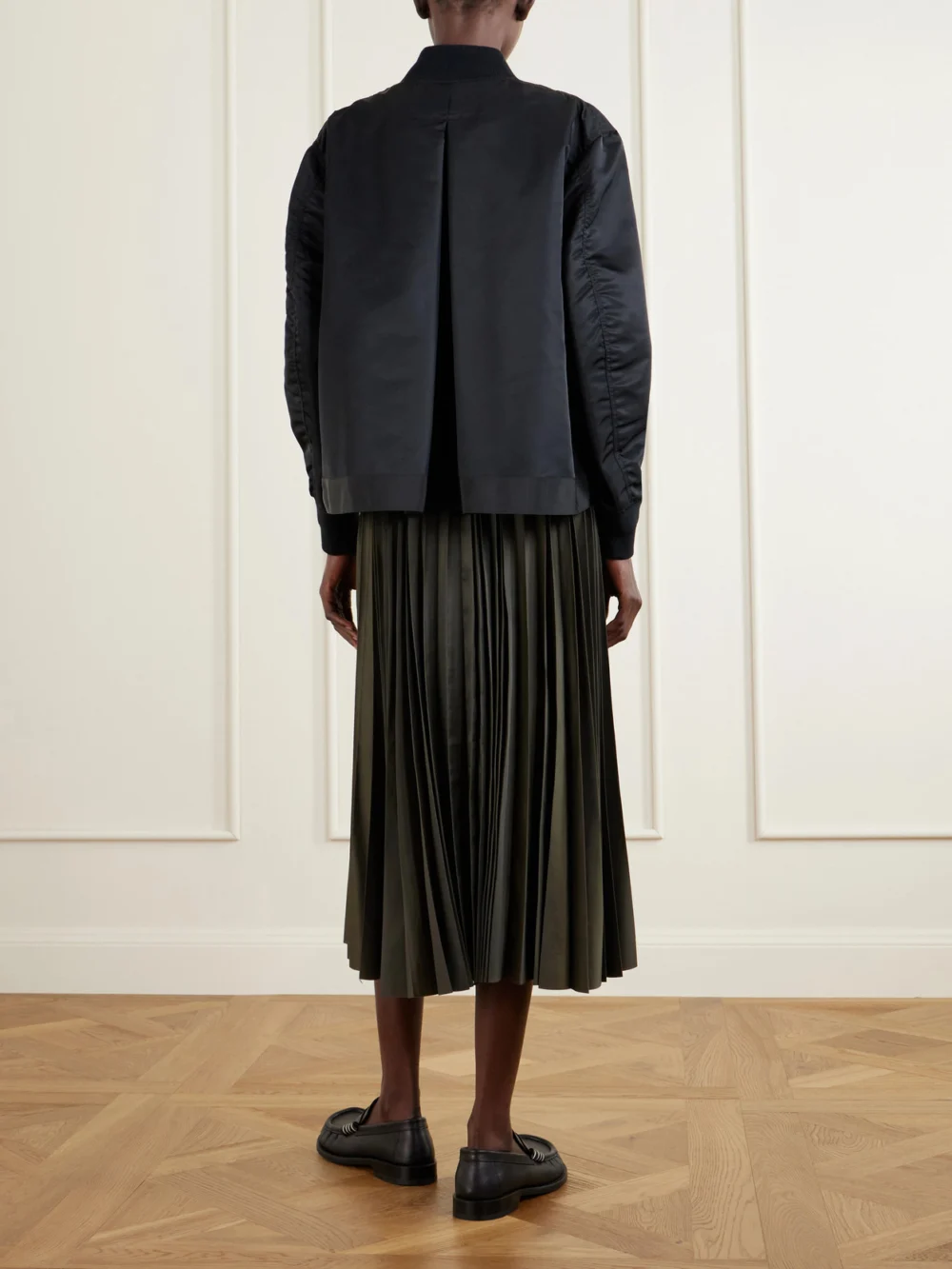 Back view of the Sacai Pleated Padded Shell Bomber Jacket