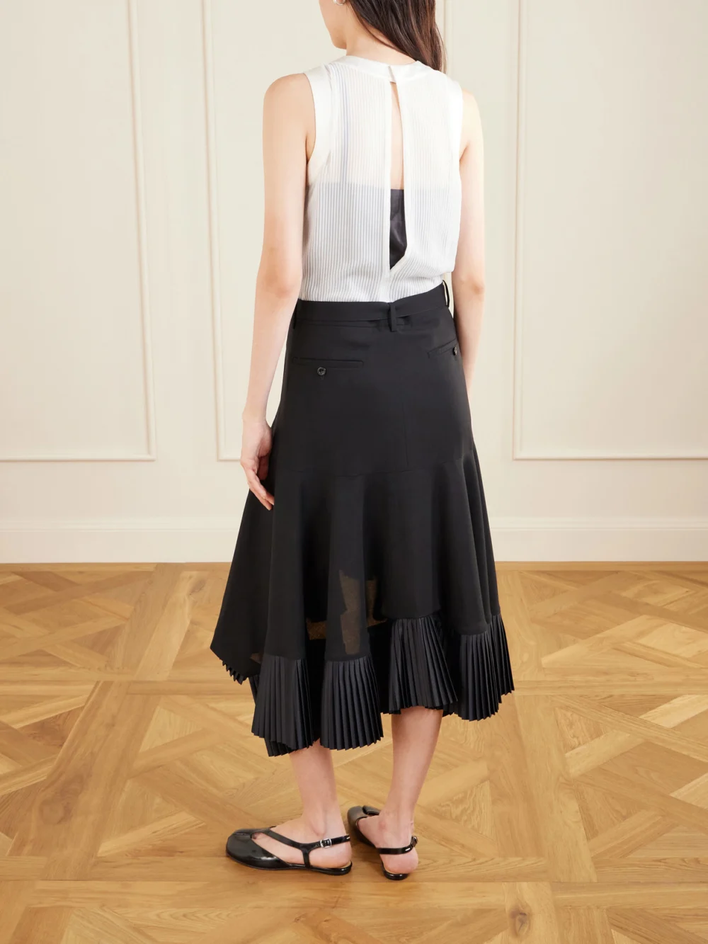 Back view of the Sacai Pleated Wool-trimmed Plissé-chiffon Midi Dress