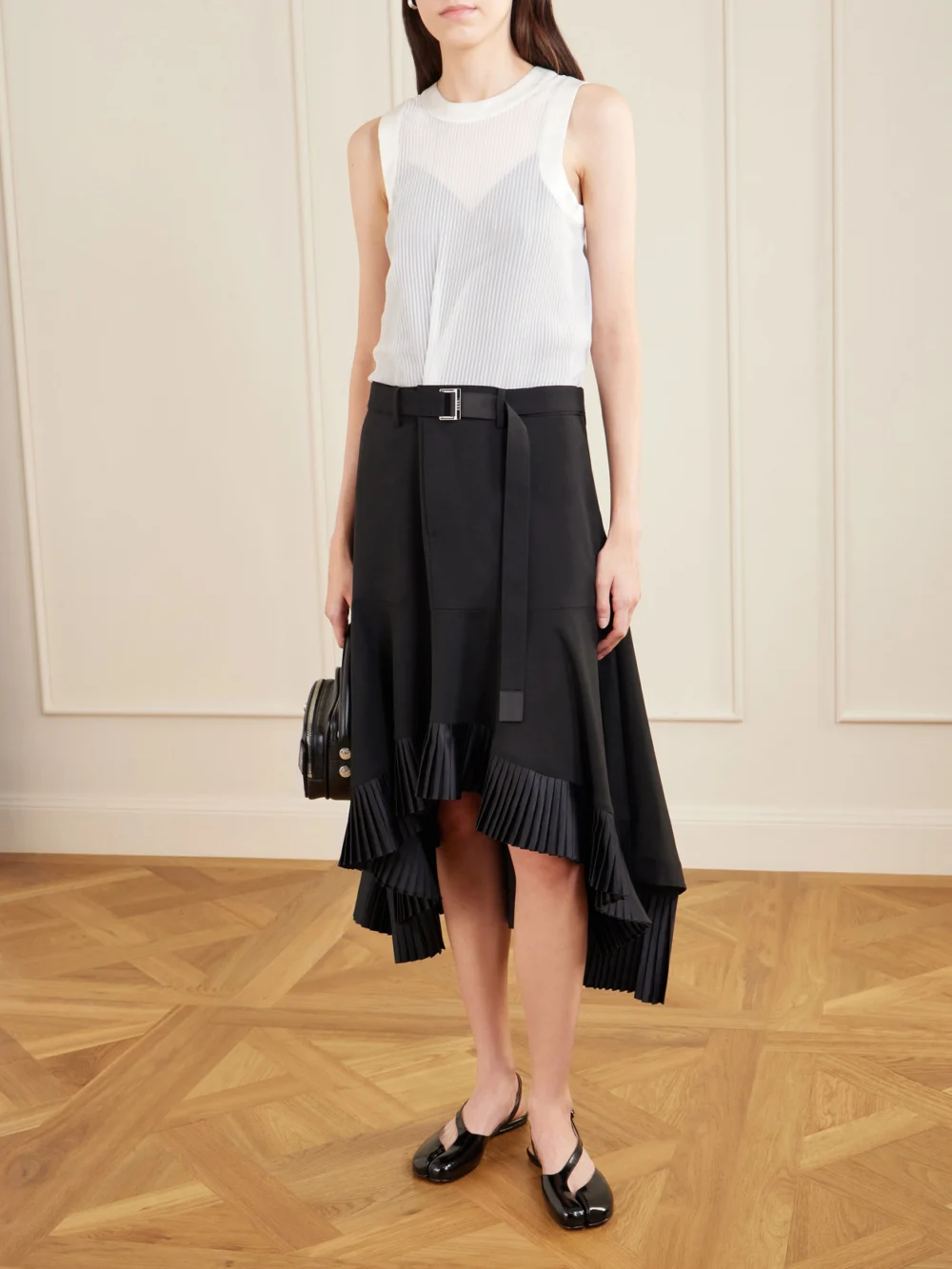 Sacai Pleated Wool-trimmed Plissé-chiffon Midi Dress, worn by a model