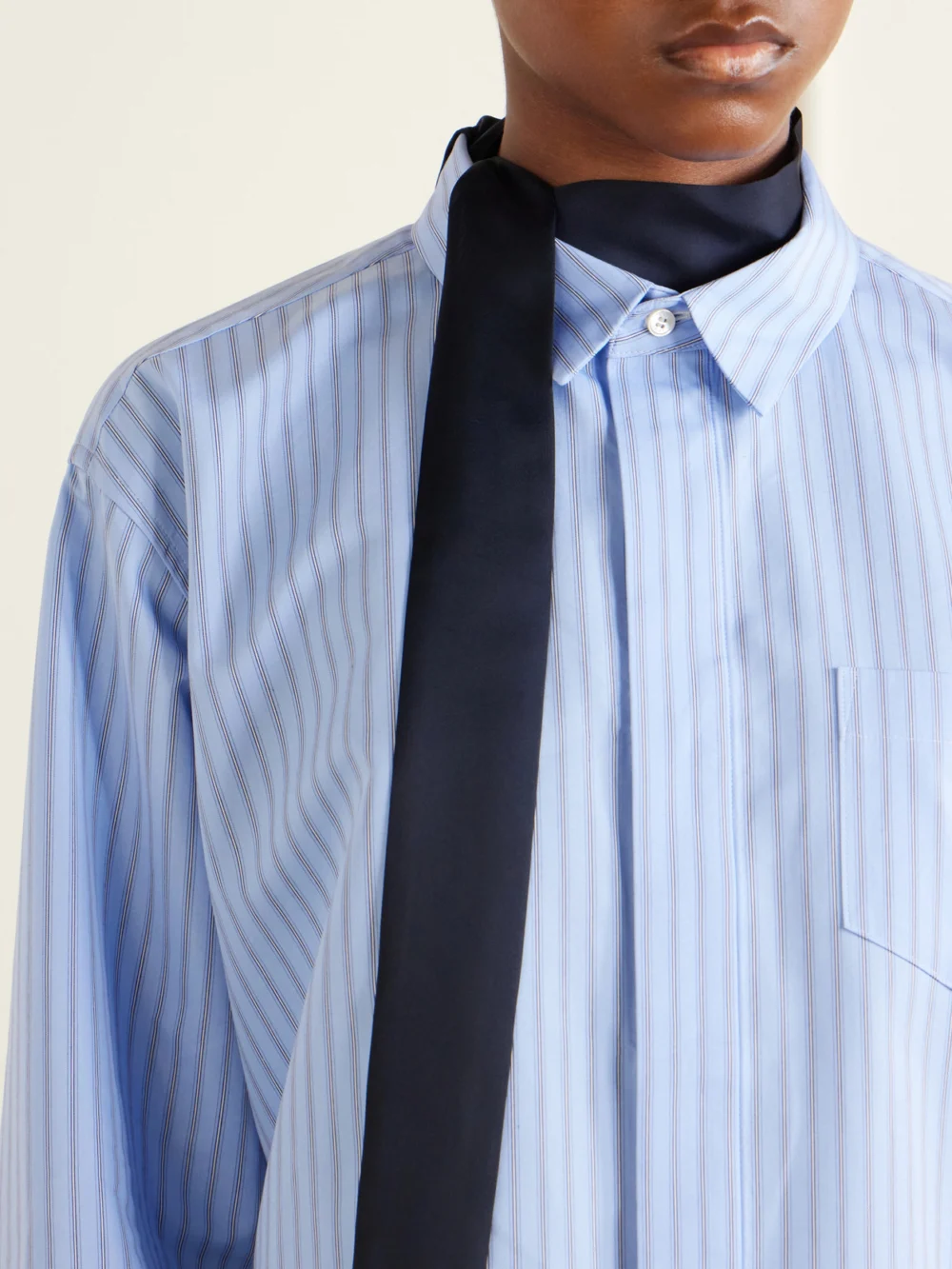 Close-up detail of the Sacai Scarf-detailed Striped Cotton-blend Poplin Mini Dress