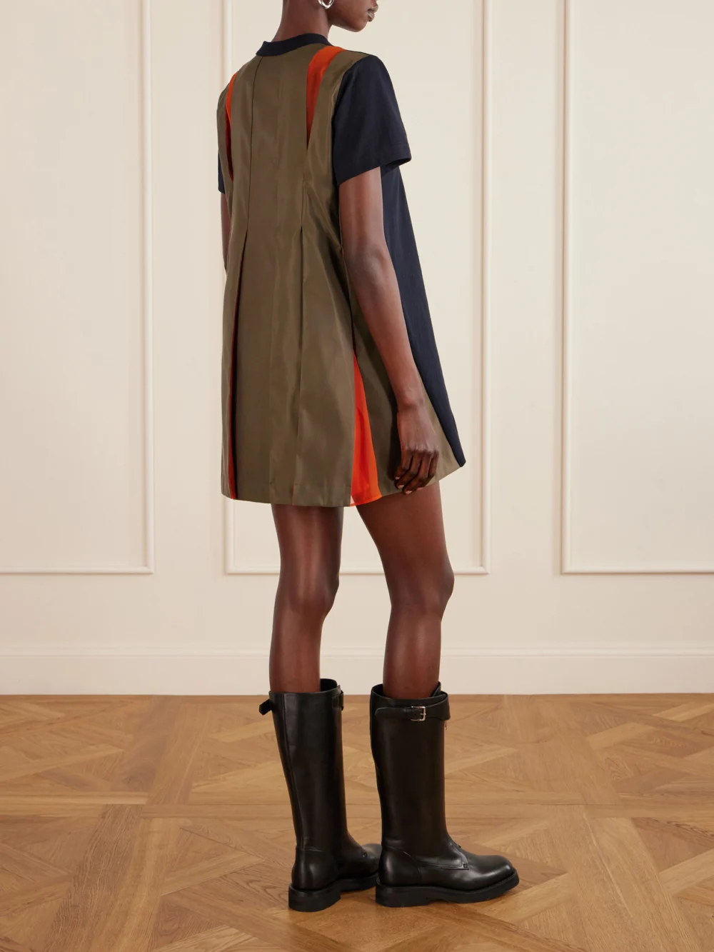 Back view of the Sacai Shell-paneled Cotton-blend Jersey Mini Dress