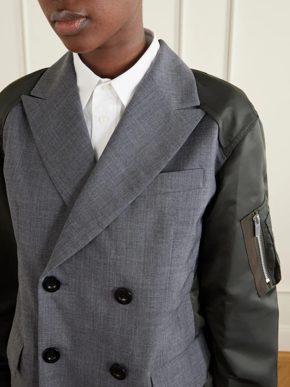 Close-up detail of the Sacai Shell-trimmed Wool Blazer