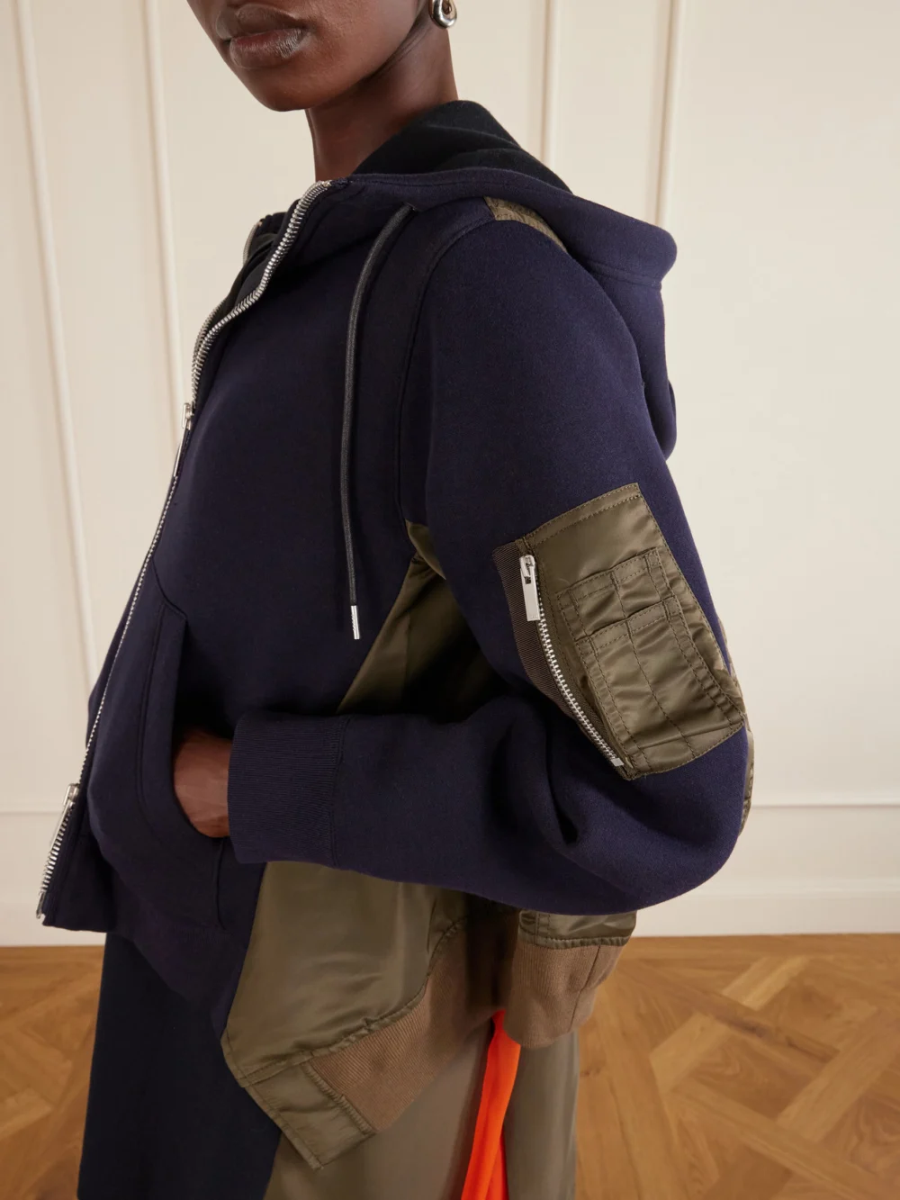 Close-up detail of the Sacai Sponge Sweat Shell-paneled Cotton-blend Jersey Zip-up Hoodie