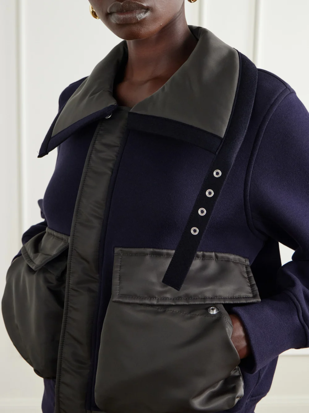 Close-up detail of the Sacai Sponge Sweat Shell-trimmed Cotton-blend and Wool Jacket