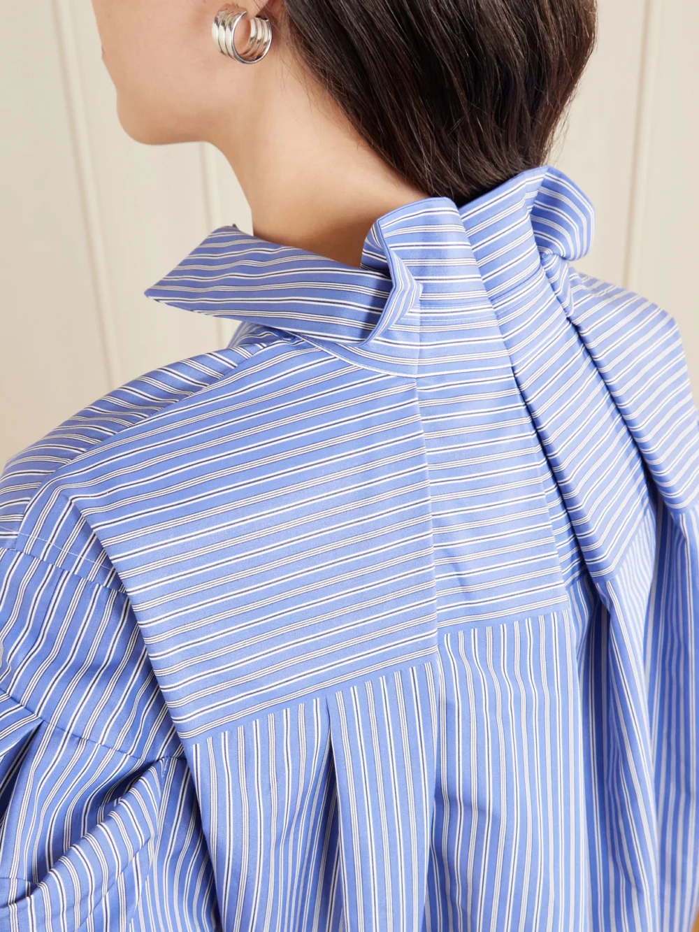 Close-up detail of the Sacai Striped Cotton-blend Poplin Shirt