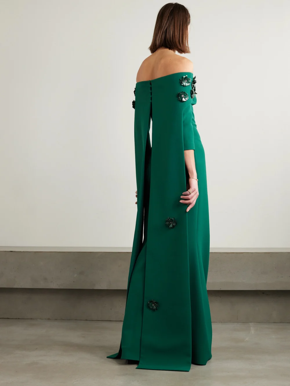 Back view of the Safiyaa Bellara Off-the-shoulder Cape-effect Embellished Stretch-crepe Gown